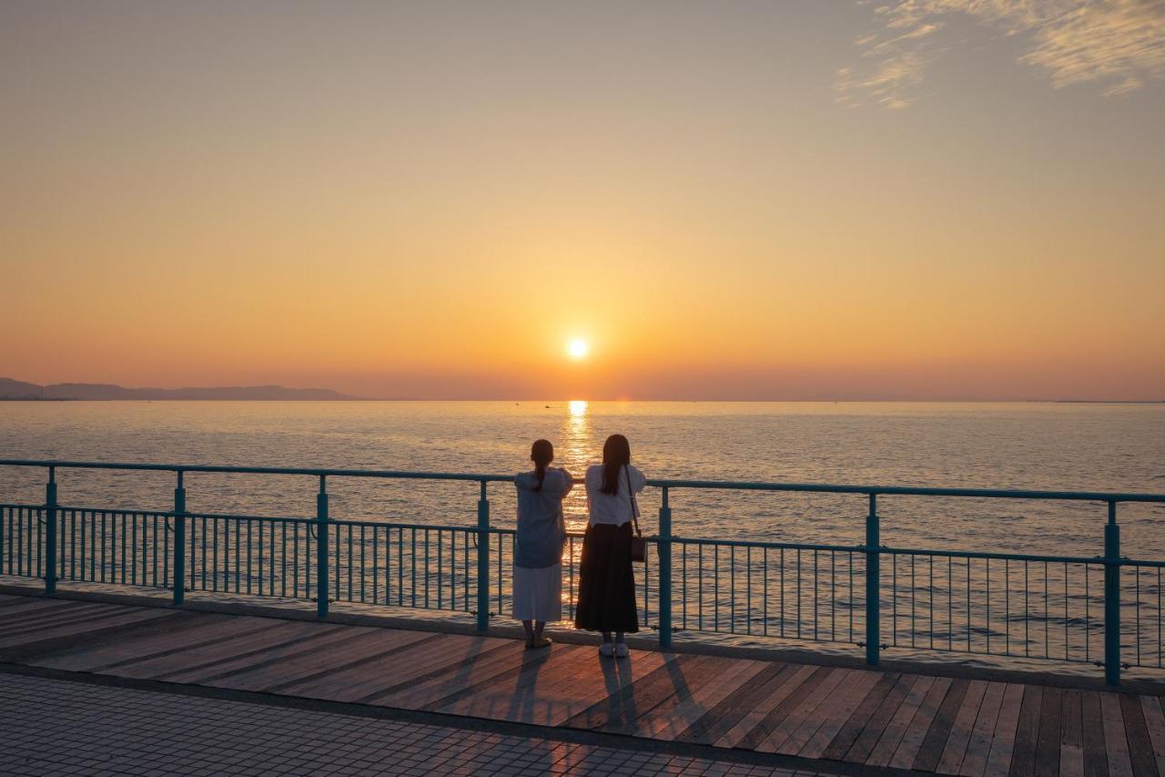 Omo Kansai Airport By Hoshino Resorts Izumisano Exterior foto Sunset at the promenade